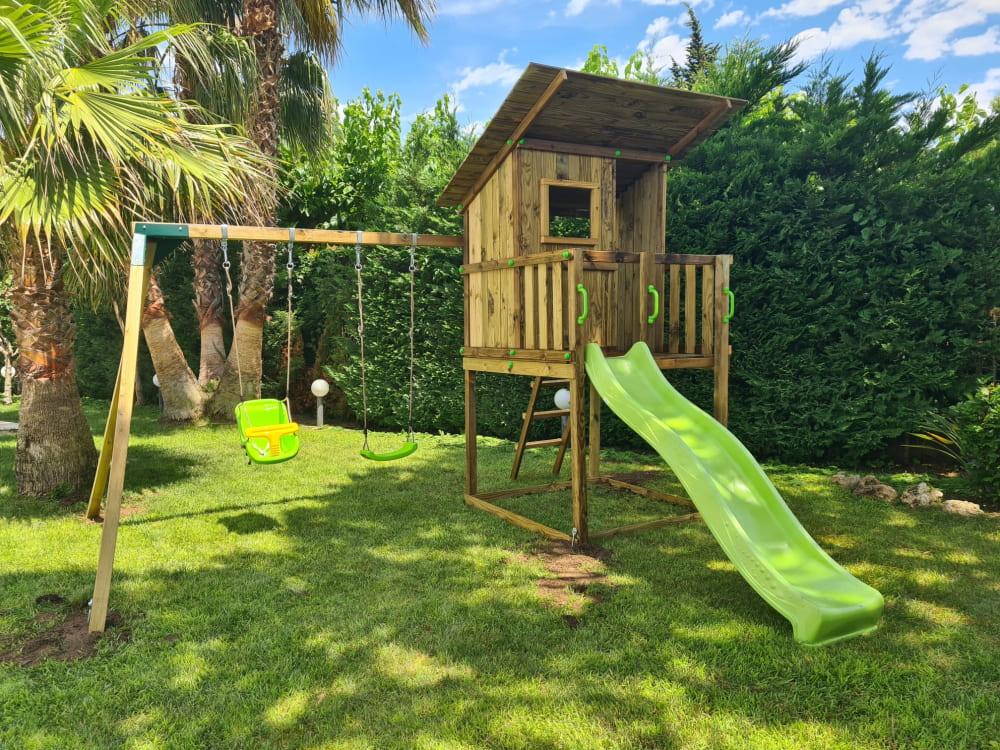 Parque infantil Masgames Beach Hut con columpios